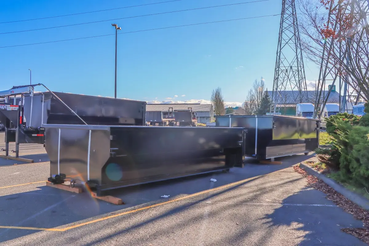 Roll-off dumpster ready for waste disposal at job site for Yard Waste Dumpster Rental in Nashville